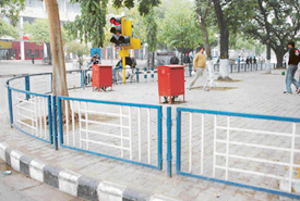 Steel railing which has been erected along a road berm in Sector 17, Chandigarh.