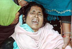 Lachi, a relative of the family that was burnt alive, bursts into tears on Thursday after hearing about the incident. A man, his wife and three children were burnt alive allegedly by a relative in the Sadiyapur locality in Allahabad.