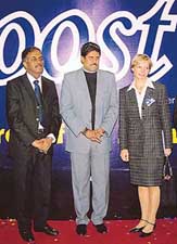 Mr Kalyansundaram, Managing Director, GlaxoSmithKline (left), with cricket legend Kapil Dev and Dr Beatrice DeVos (right), Medical Director,GSK Biologicals, at the Pedicon, 2006, conference in New Delhi on Friday. GSK announced the introduction of vaccine called Boostrix. 