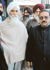 Mr Ajmer Singh, a writer, who was arrested by Chandigarh Police on the basis of wrong information provided by Kaputhala Police, after his release outside the district courts on Friday. 