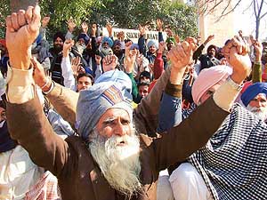 Farmers of Siwia village protest in front of the Mini-Secretariat in Bathinda on Friday.