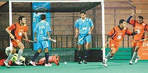 Bangalore Lions players celebrate on scoring a goal against Hyderabad Sultans during a Tier I match of the Premier Hockey League at the Sector 42 Hockey Stadium in Chandigarh on Friday