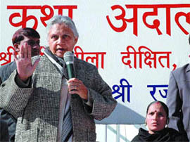 Chief Minister Sheila Dikshit replying to grievances raised by slum dwellers during a Katha Adalat, held as part of Katha Asia International Utsav at India Habitat Centre in the Capital on Saturday.