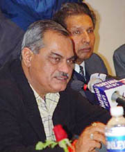 Haryana Excise and Taxation Minister Venod Sharma announces concessions after presiding over the second meeting of the state-level Consultative Committee during a press conference in Chandigarh on Saturday.