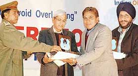 An award distribution ceremony in progress on the conclusion of the traffic week in Chandigarh on Sunday.