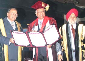 The Governor of Punjab and Chancellor of Guru Nanak Dev University, Gen S.F. Rodrigues, awards a doctorate to Mr R.A. Mashelkar, Director-General, CSIR, at the 32nd convocation of the university in Amritsar