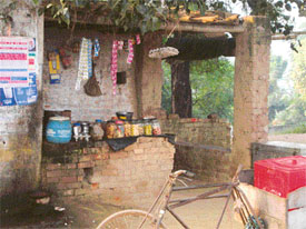 Tobacco products displayed at a kiosk situated on the main gate of a government school located along the Sirhind canal in Ludhiana
