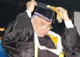 Union Law Minister H.R. Bhardwaj adjusts his mortarboard during the convocation of Guru Nanak Dev University in Amritsar on Sunday.