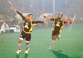 Deepak Thakur rejoices with team-mate Rajpal Singh after scoring a goal for Chandigarh Dynamos against Sher-e-Jallandhar 