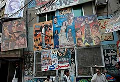 Bollywood-style movie posters dot the city of Lahore