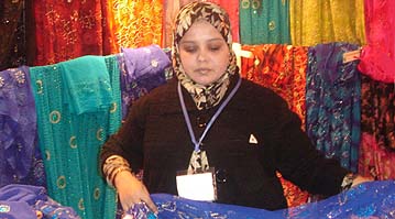 A Pakistani woman displays her wares during the Indo-Pak Expo organised in Amritsar