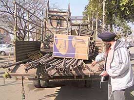 Goods being taken away in a truck during an anti-encroachment drive on Wednesday.