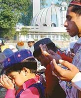 Muslims offer prayers at the Sector 20 mosque on Id-ul-Zuha in Chandigarh on Wednesday. 