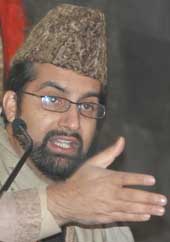 Mirwaiz Umer Farooq, Chairman, All-Party Hurriyat Conference, addresses Kashmiri Muslims before offering Eid prayers at Jama Masjid in Srinagar on Wednesday.