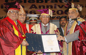 The Haryana Governor and Chancellor of Kurukshetra University, Dr A.R. Kidwai, confers the degree of Doctor of Literature (honoris causa) on Mr H.K. Dua, Editor-in-Chief, The Tribune Group of Publications, at the golden jubilee function of the university at Kurukshetra on Wednesday.