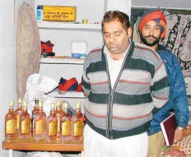 Chander Sabharwal, a tea vendor, who was caught with smuggled liquor in Ludhiana on Tuesday. 