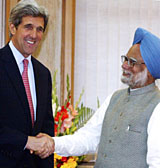 US Senator and former Democratic presidential candidate John Kerry shakes hands with Prime Minister Manmohan Singh before a meeting at the Prime Minister's residence in New Delhi on Wednesday.