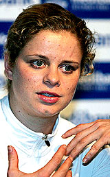Belgiums Kim Clijsters addresses a press conference where she announced her withdrawal due to a hip injury from the Sydney International tennis tournament on Wednesday