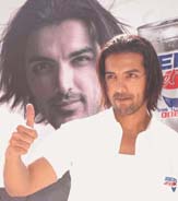 Bollywood star John Abraham greets media after he signed up as brand ambassador for Pepsi Diet in Mumbai on Thursday. As an ambassador of the brand, Abraham will be seen in the companys new commercial, Salsa. 