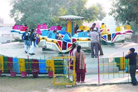 School students check out the latest rides on offer at Niku Park in the city