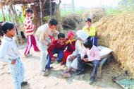  It is sunny side up for these villagers even in biting chill