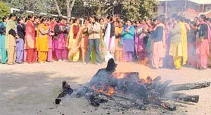 Students of Guru Nanak Girls College celebrate Lohri on the college campus in Ludhiana on Friday
