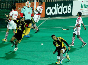 Players in action during a Premier Hockey League match between Chandigarh Dynamos and Maratha Warriors at the Sector 42 Hockey Stadium in Chandigarh on Friday