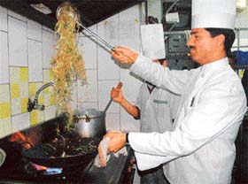 A MountView chef busy tossing up noodles
