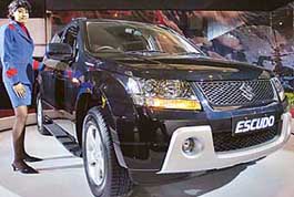 A model displays Maruti Escudo during the ongoing 8th Auto Expo, 2006, in New Delhi on Saturday.