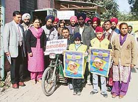 Dr Rajinder Kaur, Civil Surgeon, leads a polio awareness rally in Ludhiana on Saturday. Photo: I.V.