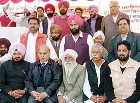 Punjab Transport Minister Mahinder Singh Kaypee and other Congress leaders at the partys rally at Takhtupura village in Moga district on Saturday