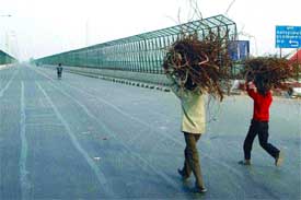 ITO Bridge wears a deserted look at Vikas Marg in the Capital on Sunday