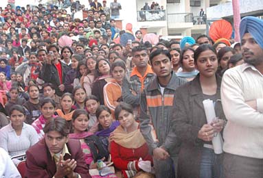 Students throng the open air theatre in Lyallpur Khalsa College to watch the cultural meetGalaxy 2006 in Jalandhar on Sunday. The event was organised by the colleges Commerce Department.