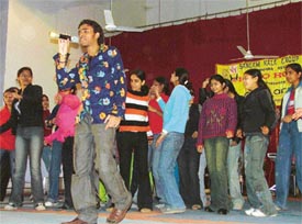 A young participant performs at a singing competition organised by the Sangam Kala Group at the Government College for Women in Ludhiana on Sunday