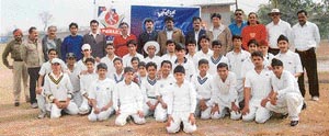 Teams of KVM School and CFC School pose with office-bearers of the Ludhiana Cricket Association prior to the inaugural match of the PCA Parle Inter-School Cricket Tournament in Ludhiana on Sunday
