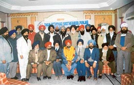 Mr N.S. Nanda along with members of the Dhan Pothohar Brotherhood Punjab after being re-elected president of the organisation