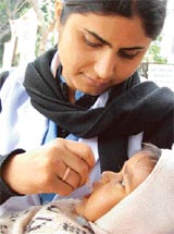A child gets polio drops during the second round of the polio drive in Ludhiana on Sunday