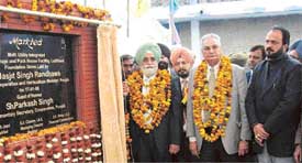 Cooperation Minister Jasjit Singh Randhawa along with Parliamentary Secretary Parkash Singh and the MD, Markfed, Mr S. S. Channy, after laying the foundation stone of a modern integrated multi-utility cold store-cum-pack house at  Dhandari Kalan, near Ludhiana, on Tuesday