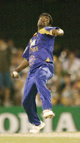 Muttiah Muralitharan bowls during Sri Lankas one day  match against South Africa at the Gabba in Brisbane