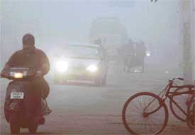 Commuters had a hard time on roads due to the foggy conditions in Ludhiana on Wednesday morning