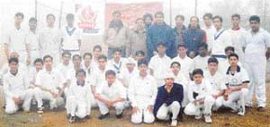 Teams of Sanatan Vidya Mandir School and Spring Dale School with the chief guest before the start of play at the Baba Bachan Singh Academy ground, Balloke village, near Haibowal Khurd on Wednesday