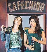 Kareena Kapoor and Priyanka Chopra pose as they launch Pepsis new product, Cafe Chino, in Mumbai on Thursday. The product has coffee aroma. 
