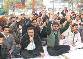 Employees of the State Bank of Patiala stage a dharna in support of their demands in Ludhiana on Thursday. 