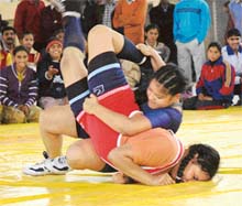 Wrestlers in action during the 51st National School Games in Ludhiana on Friday