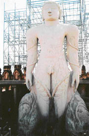 The monolith statue of Bahubali with the scaffolding at its rear