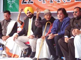 Mr Vinod Khanna and Mr Navjot Sidhu, BJP MPs from Gurdaspur and Amritsar, respectively, at the BJP rally in Pathankot on Sunday.