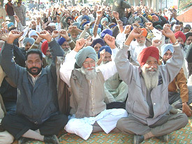 Activists of the Kirti Kisan Union stage a dharna in front of the Deputy Commissioners office in Amritsar on Monday.