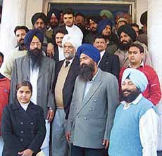 Senior leader of Akali Dal (Badal) Kiranvir Singh Kang comes out of the court after hearing in a shootout case in Kharar on Monday.