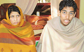Wife of the deceased Sunita with  son Dheeraj.