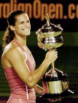 Frances Amelie Mauresmo is all smiles after winning the womens singles final against Belgiums Justine Henin-Hardenne at the Australian Open in Melbourne on Saturday